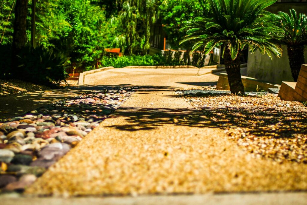 Resin Bound vs Tarmac: SuDS Compliance for Front Gardens
